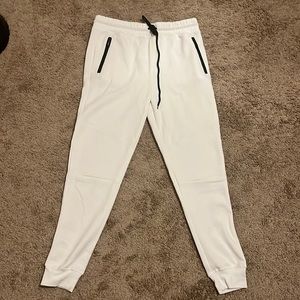 White, large, rue 21 sweats with zipper pockets, 52% cotton and 48% polyester